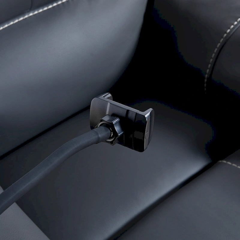 Fauteuil inclinable électrique noir, avec massage, chauffage, ports USB, support pour téléphone et poches latérales, inclinaison réglable jusqu'à 139°.