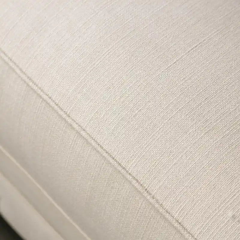 Canapé Cury Glam beige en tissu capitonné avec garniture cloutée, par Furniture of America
